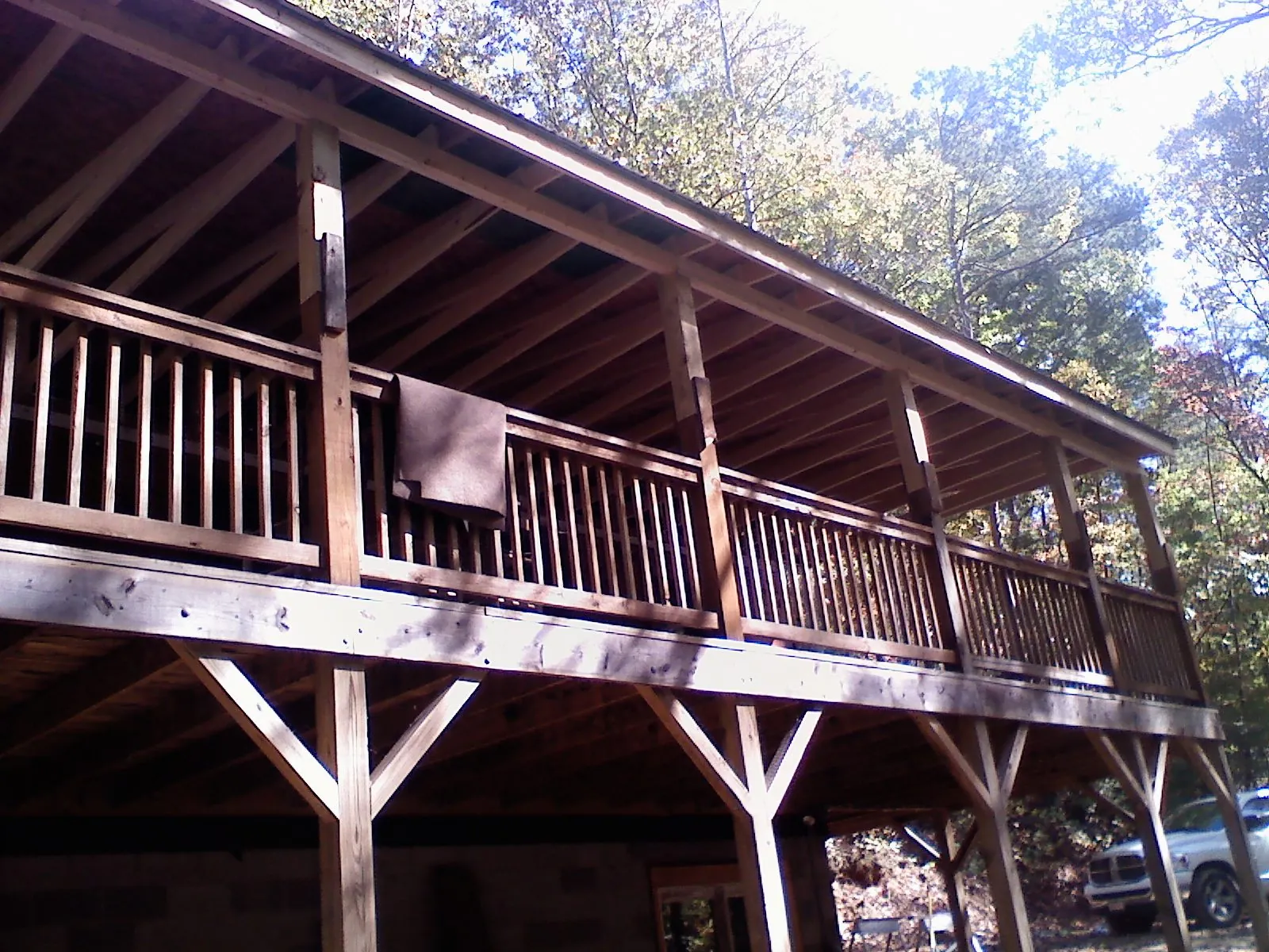Timber framing under a new elevated porch and deck — Roof Leak Repair in Yorkville by Roofing Brothers